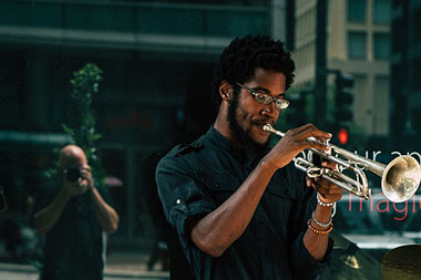 Man plays on saxophone
